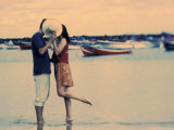 Kissing Couple at Playa de las Teresitas, Tenerife, Canary Islands, Spain Photographie par Michele Westmorland