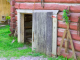 Historic Log Building in Talkeetna, Alaska, USA Photographic Print by Julie Eggers