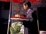 Local Baker Brings out Fresh Goods, Nessebur, Bulgaria Photographic Print by Cindy Miller Hopkins