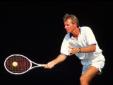 Close-up of Man Playing Tennis Photographic Print by Bill Bachmann