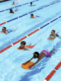 Children Learning to Swim Photographic Print by Bill Bachmann