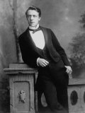 Elgant Young Man Posing for Studio Portrait Attired in Black Tie and Tails Lámina fotográfica Elgant Young Man Posing for Studio Portrait Attired in Black Tie and Tails Lámina fotográfica