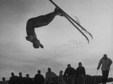 Acrobatic Skier Jack Reddish in Somersault at Sun Valley Ski Resort Lámina fotográfica por J. R. Eyerman