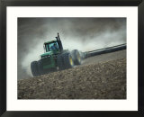 Tractor in Dusty Field Poster