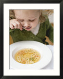 Small Girl Eating Soup with Teddy Bear Pasta Posters