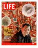 Alexander Tsiaras in Front of Computer Enhanced Visualization of Blood Cells, August 26, 2005 Photographic Print by Joseph Astor
