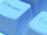 Close-Up of Gray Delete Button on Computer Keyboard Photographic Print