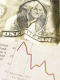 Crumpled American Dollar Bill on Red Graph of Economic Loss Lámina fotográfica