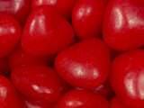 Cropped Shot of a Seletion of Vibrant Red Cinnamon Heart Candies Photographic Print