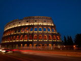 Lights Illuminating from the Historical Coliseum in Rome at Night Photographic Print