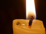 Bright Warm Flame and Melting Wax on Lit Candle Photographic Print