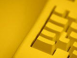 Yellow Tinted Computer Keyboard Photographic Print