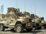 Mine Resistant Ambush Protected Vehicles Sit in the Parking Area at Joint Base Balad, Iraq Photographic Print by Stocktrek Images 