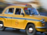 Yellow Ambassador Taxi, Calcutta, Kolkata, West Bengal, India Photographic Print by Jane Sweeney
