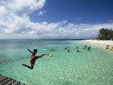New Caledonia, Amedee Islet, Polynesian Kids Playing on Amedee Islet Beach Photographic Print by Walter Bibikow