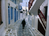 Woman Walking Down an Alley, Mykonos Town, Mykonos, Greece Photographic Print by Doug Pearson