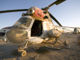 Iraqi Helicopter Sits on the Flight Deck Abandoned at Camp Warhorse Photographic Print by Stocktrek Images 