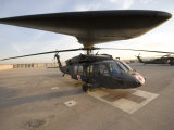 UH-60 Blackhawk Medivac Helicopter Sits on the Flight Deck at Camp Warhorse Photographic Print by Stocktrek Images 