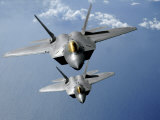 Two F-22 Raptors Fly over the Pacific Ocean Fotografie-Druck von Stocktrek Images 