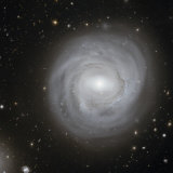 Spiral Galaxy NGC 4921 Photographic Print by Stocktrek Images 