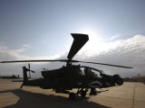 AH-64 Helicopter Sits on the Flight Line at Camp Speicher Photographic Print by Stocktrek Images 