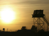 Camp Warhorse Guard Tower at Sunset Photographic Print by Stocktrek Images 