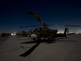 AH-64 Apache Waits on the Flight Line at Night at Camp Speicher Photographic Print by Stocktrek Images 