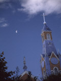 First Quarter Moon Rising Near a Church Steeple, Chile Photographic Print by Marcia Kebbon