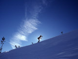 Silhouette of a Woman Cross Country Skiing Up a Snowy Slope, Mount Rose, Nevada, United States Photographic Print by Kate Thompson