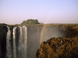 Mighty Zambezi River Creates a Rainbow over Victoria Falls, Victoria Falls National Park, Zimbabwe Photographic Print by Jason Edwards
