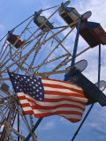 Flag in Front of a Ferris Wheel Against a Summer Sky, New London, Connecticut, USA Photographic Print by Todd Gipstein