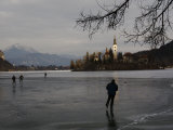 Hockey Players Brave the Cold and the Thin Ice for an Afternoon Game, Bled, Slovenia Fotografie-Druck von Melissa Farlow