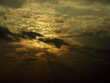 Sun Obscured by a Late Afternoon Storm Cloud Formation, Etosha National Park, Namibia Photographie par Jason Edwards