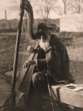 Elderly Musician Playing the Harp Photographic Print by Giosue Nencioni