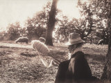 Woman Sitting in the Wood Concentrating on Winding the Wool around a Spindle Lámina fotográfica por Ludovico Pacho