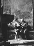Two People Sitting in a Church Photographic Print by Luciano Ferri