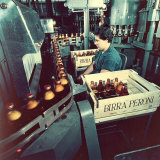 Peroni Factory, Worker Operating a Machine That Moves Bottles Full of Beer Photographic Print by A. Villani Peroni Factory, Worker Operating a Machine That Moves Bottles Full of Beer Photographic Print by A. Villani