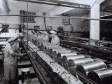Workers Monitoring the Canning of Fruit in the Fruttabella Factory Photographic Print by A. Villani