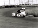Two Motorcyclists in a Race, on a Two Seater Motorcycle Stampa fotografica di A. Villani Two Motorcyclists in a Race, on a Two Seater Motorcycle Stampa fotografica di A. Villani