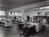 Three Technicians in the Naarden Leepen Factory for the Production of Bases for Perfume Photographic Print by A. Villani
