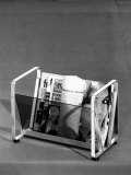 Model of a Magazine Rack by the Mascagni Furniture Company in Bologna Photographic Print by A. Villani