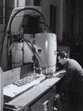 Worker Operating a Machine in the Ferrari Factory Photographic Print by A. Villani