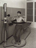 Radius Institute, a Patient Sitting on a Bed is Undergoing Chest Therapy Photographic Print by A. Villani