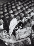 Pannetone, a Bottle of Champagne and a Glass Sitting on a Platter Photographie par A. Villani