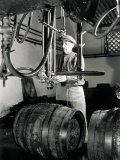 Worker in Front of Some Isobarometric Equipment Inside a Brewery Photographic Print by A. Villani