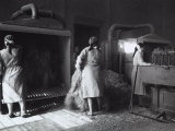 In a Textile Factory a Few of Women Workers Sort the Raw Hemp by Means of Machinery Photographic Print by A. Villani
