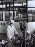 Two Workers Producing Chemical and Pharmaceutical Material in the Glaxo Factory Photographic Print by A. Villani