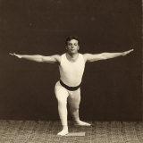 Portrait of a Young Gymnast as He Performs an Exercise Photographic Print by Carlo Wulz