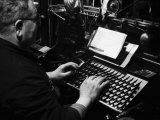 Worker at His Typewriter in Newspaper Printing Facility of the Daily Il Resto Del Carlino, Bologna Photographic Print by A. Villani