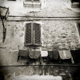 Laundry Hanging from Wall of Old Building, Siena, Tuscany, Italy Photographic Print by Lee Frost